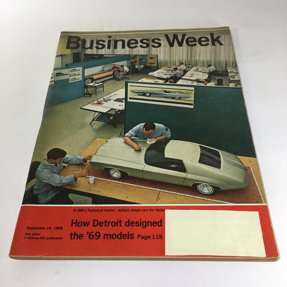Cover of Business Week Magazine from September 14, 1968, featuring a detailed depiction of car designers working on models for the 1969 automobile designs at GM's Technical Center. The magazine emphasizes the innovation in automotive design of the era.