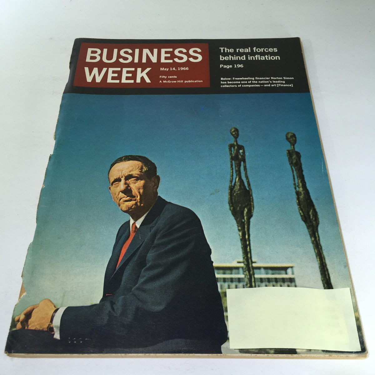 Cover of Business Week Magazine from May 14, 1966, featuring the title 'Business Week: The Real Forces Behind Inflation' with a portrait of financier Norton Simon, set against a striking blue sky backdrop.