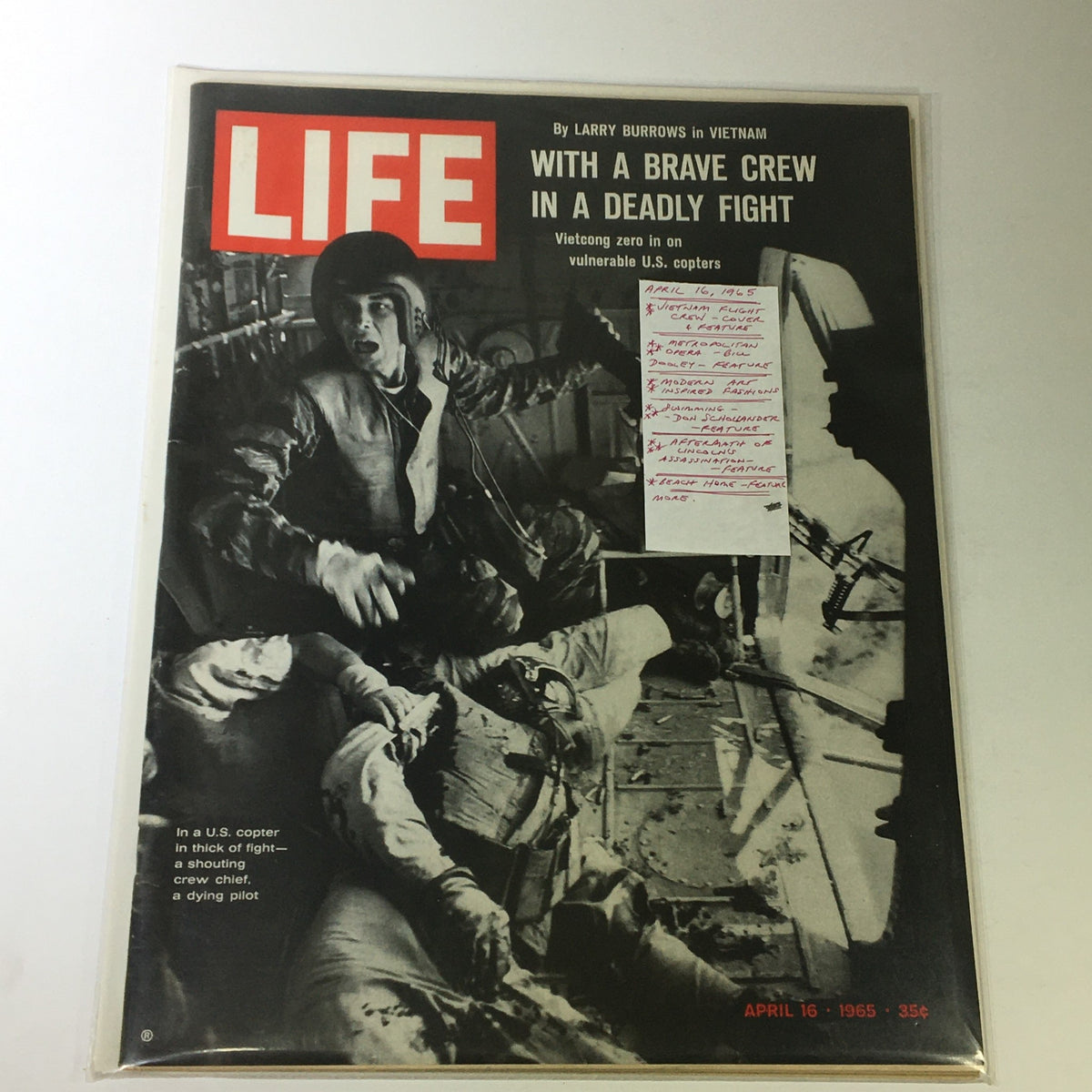 VTG Life Magazine April 16 1965 cover featuring a dramatic photograph of a soldier in a U.S. copter during a dangerous situation, highlighting the Vietnam War. The cover includes the magazine's title 'LIFE' prominently displayed.