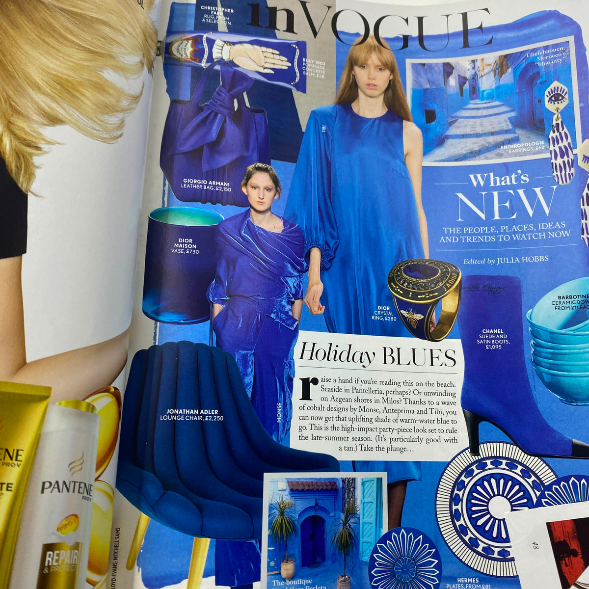 Fashion spread from Vogue UK Magazine August 2017 showing models in striking blue outfits and colorful decor, highlighting the summer trends of 2017.