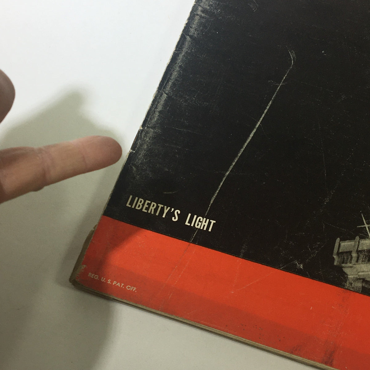 Side view of the cover of VTG Life Magazine June 26 1944 highlighting 'Liberty's Light' with a finger pointing.