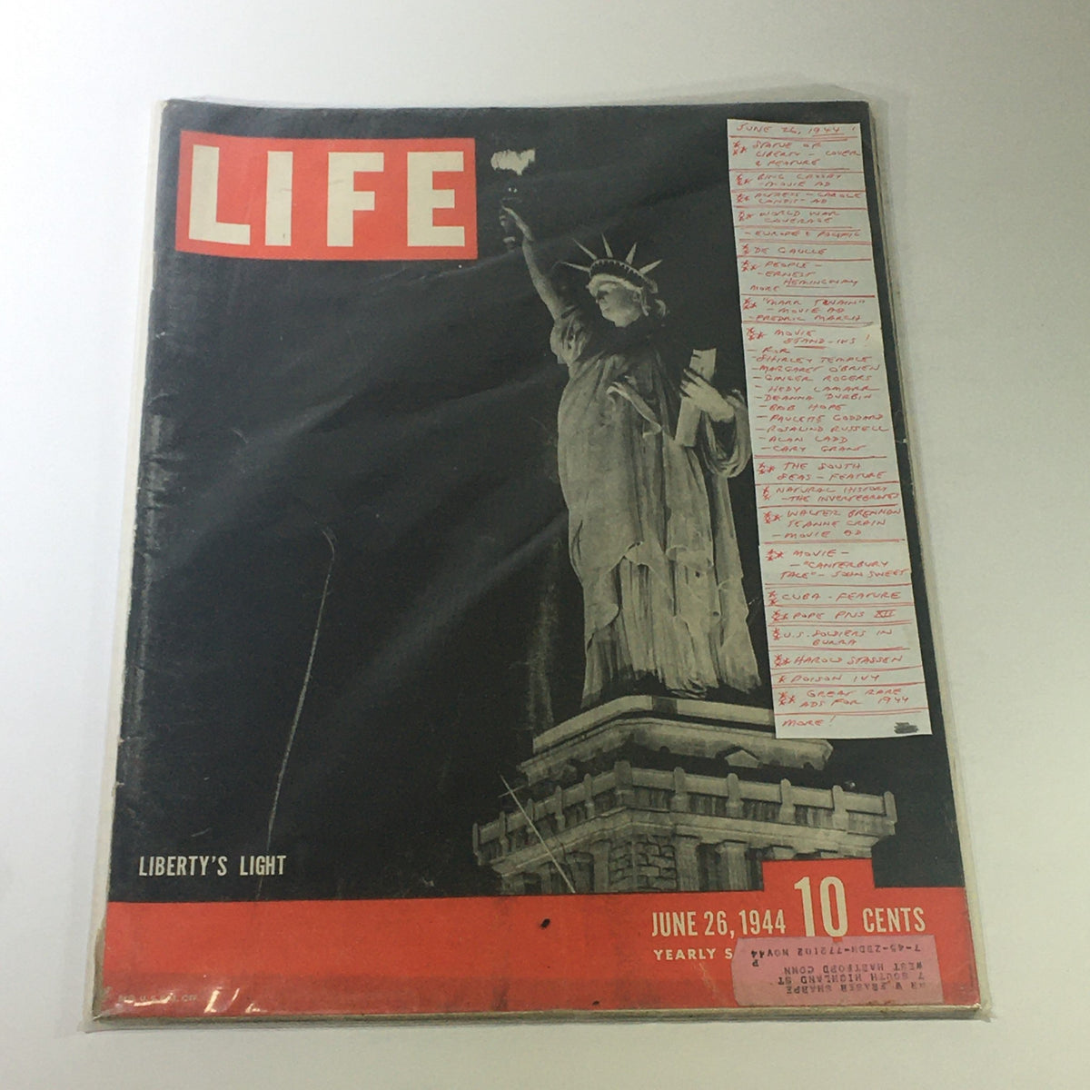 Front cover of VTG Life Magazine June 26 1944 in protective sleeve with marks indicating previous ownership.