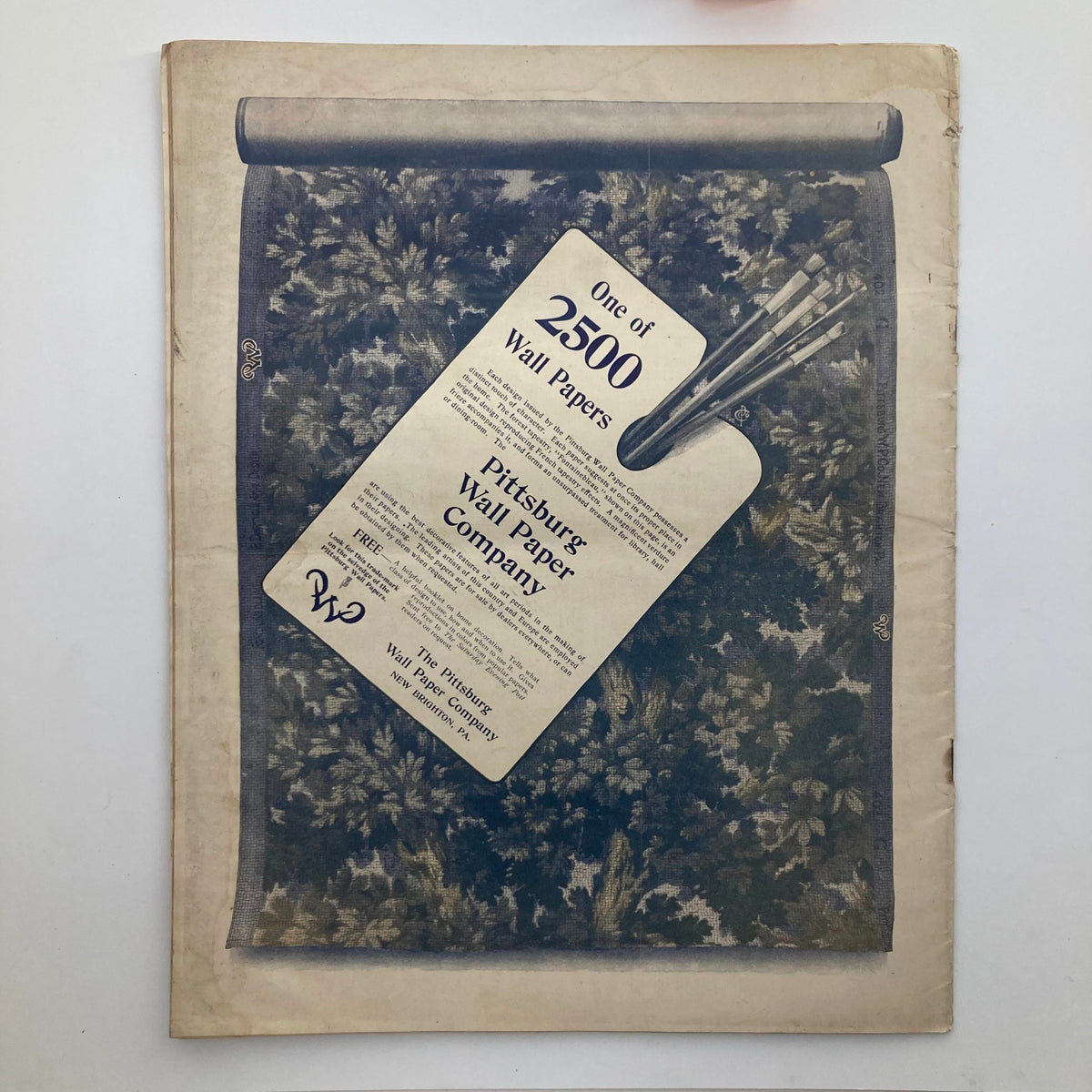 Back cover of The Saturday Evening Post March 22 1902 displaying an advertisement for Pittsburg Wall Paper Company, featuring a decorative wallpaper design.