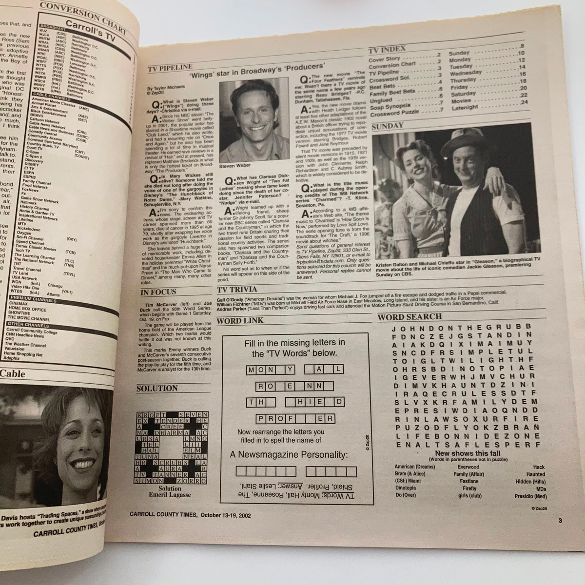 Interior page of TV Week Magazine dated October 13, 2002, displaying TV listings and trivia, with a focus on the show Smallville.