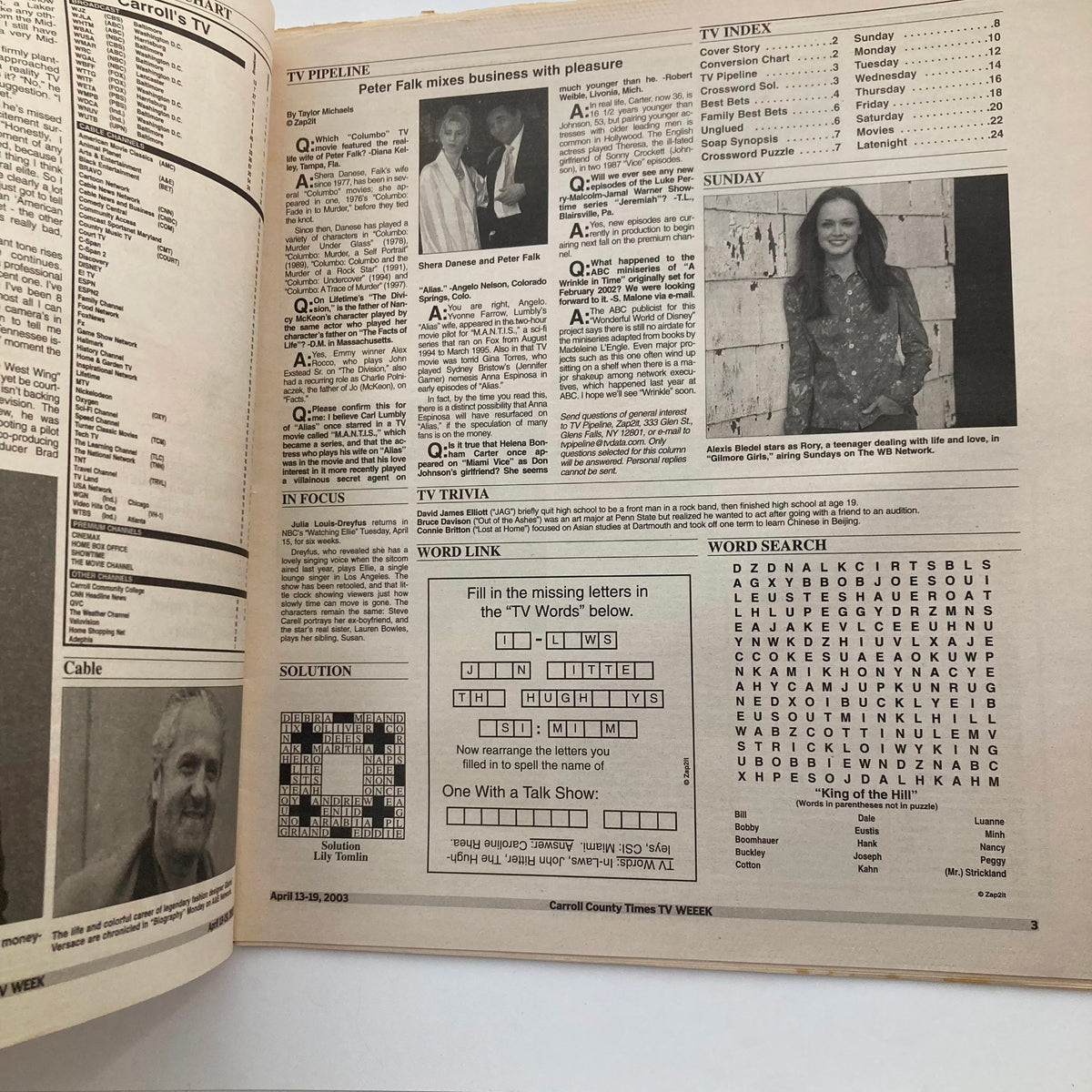 Inside page of TV Week Magazine April 13 2003, includes listings and features such as TV trivia and interviews, reflecting television culture of the early 2000s.