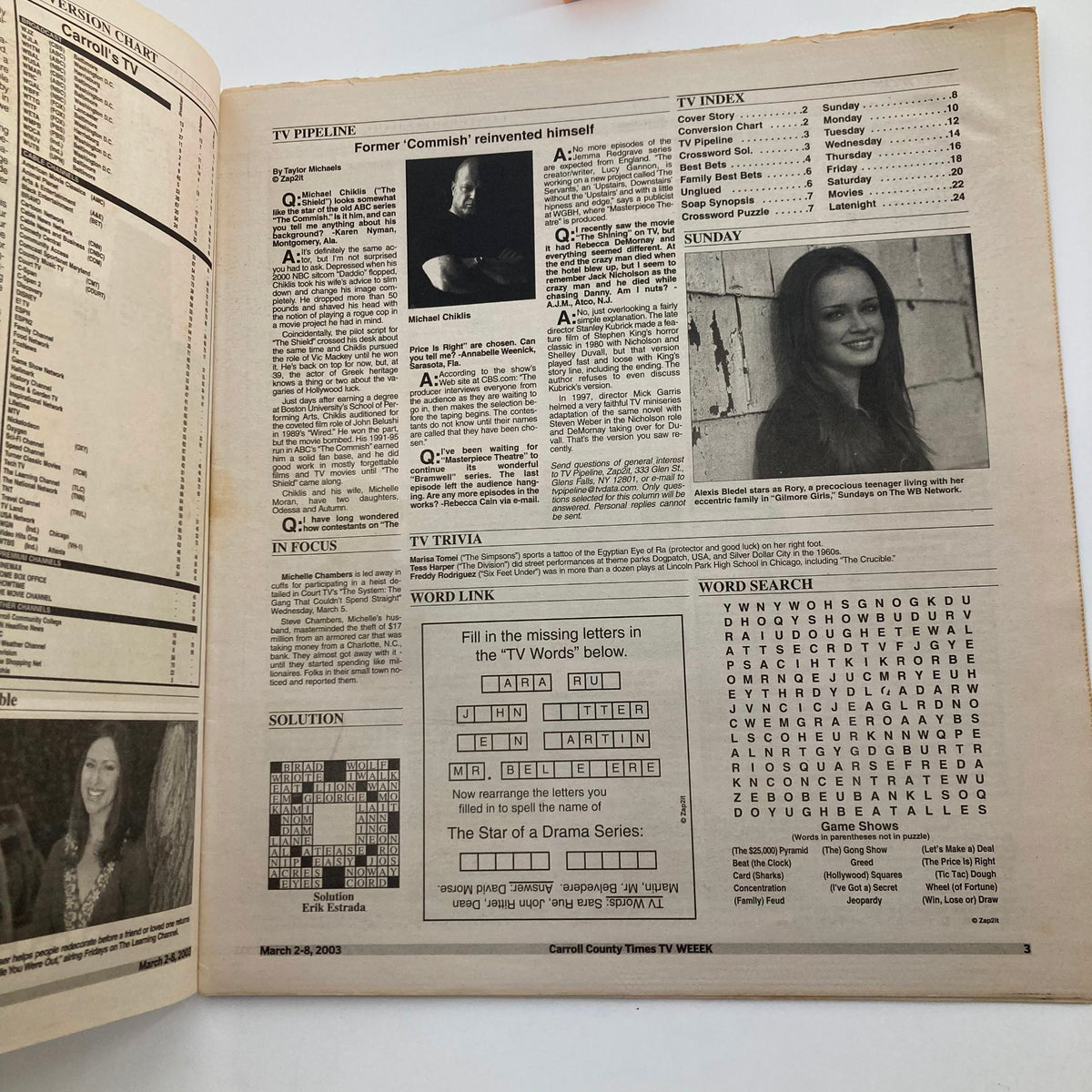 Interior page of TV Week Magazine March 2, 2003, displaying TV listings, trivia, and features including a profile of Michael C. Hall and other television highlights.