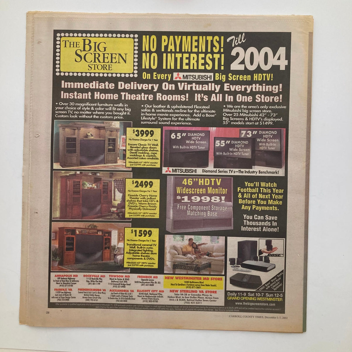 Advertisement page from TV Week Magazine December 1 2002 promoting Mitsubishi Big Screen HDTVs with no payment until 2004.