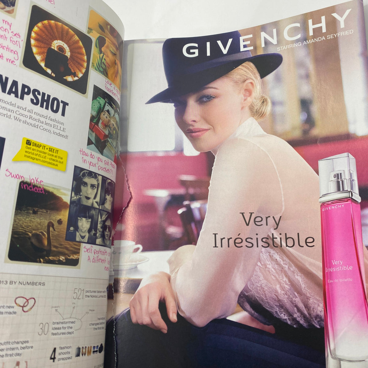 Interior page of Elle UK Magazine October 2013 showcasing a Givenchy advertisement with Amanda Seyfried and highlights from the issue.
