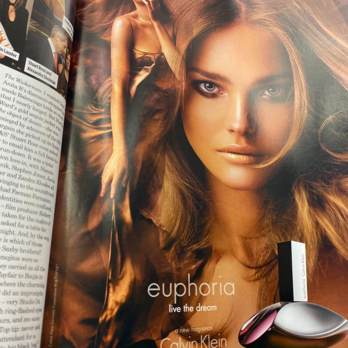 Ad for Calvin Klein's fragrance 'Euphoria' featured in Vogue UK Magazine January 2006, highlighting beauty and style of the era.