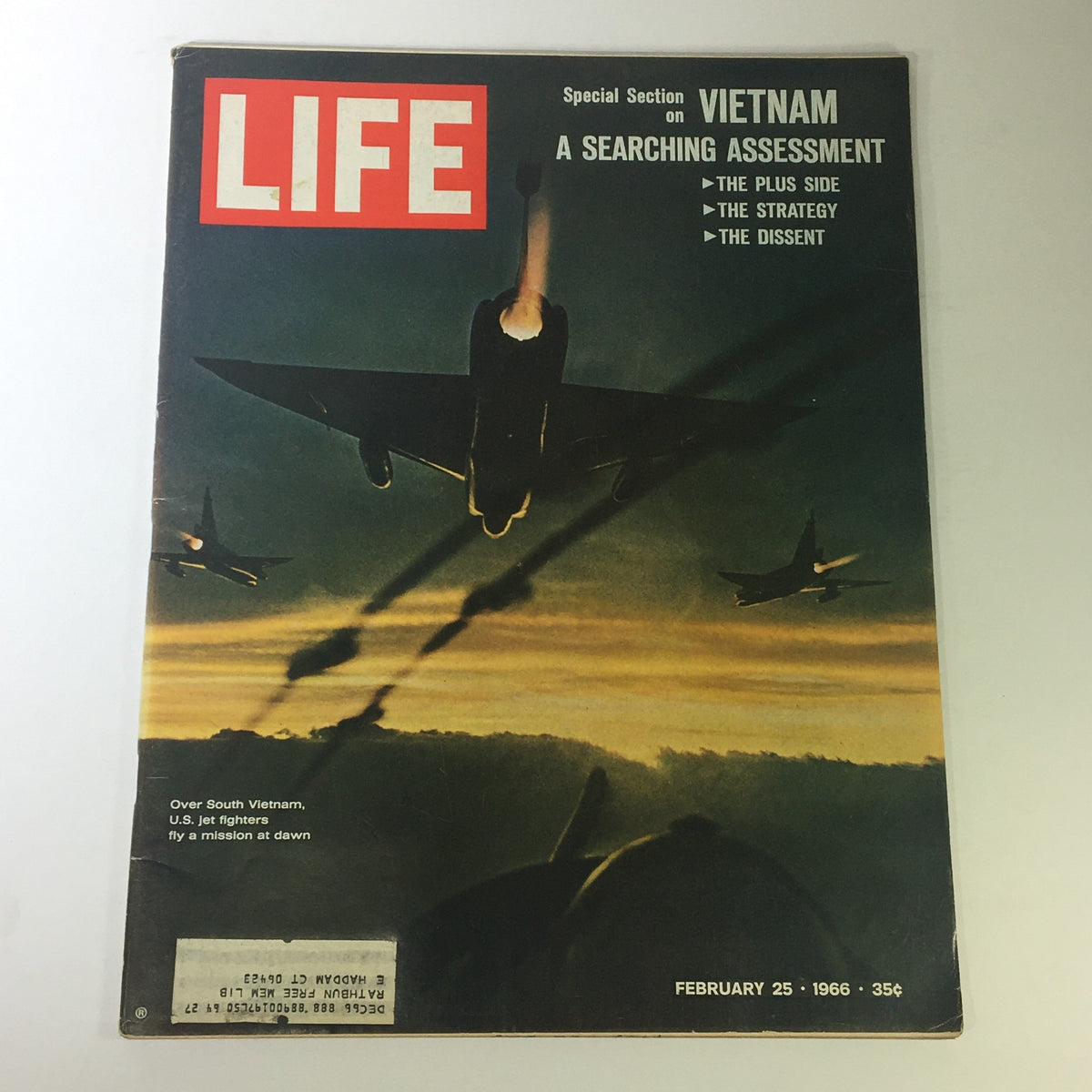 Cover of VTG Life Magazine February 25 1966 featuring the headline 'A Searching Assessment in Vietnam', showcasing U.S. jet fighters in action during dawn over South Vietnam.