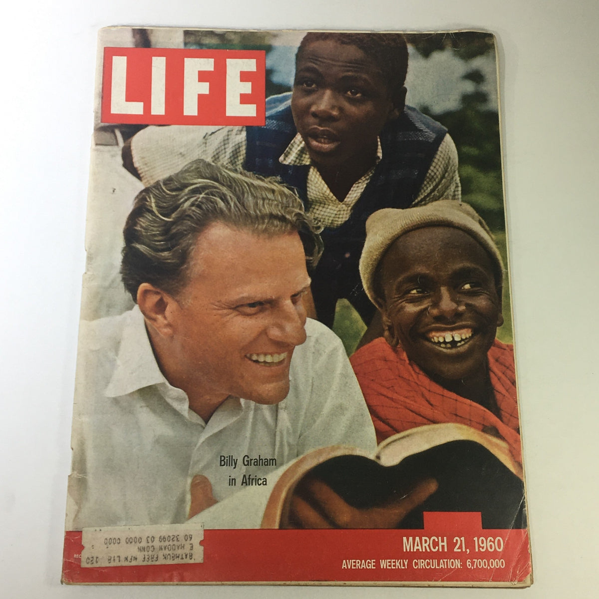 Cover of Life Magazine from March 21, 1960 featuring Billy Graham in Africa, showcasing the influential religious leader with two other individuals.