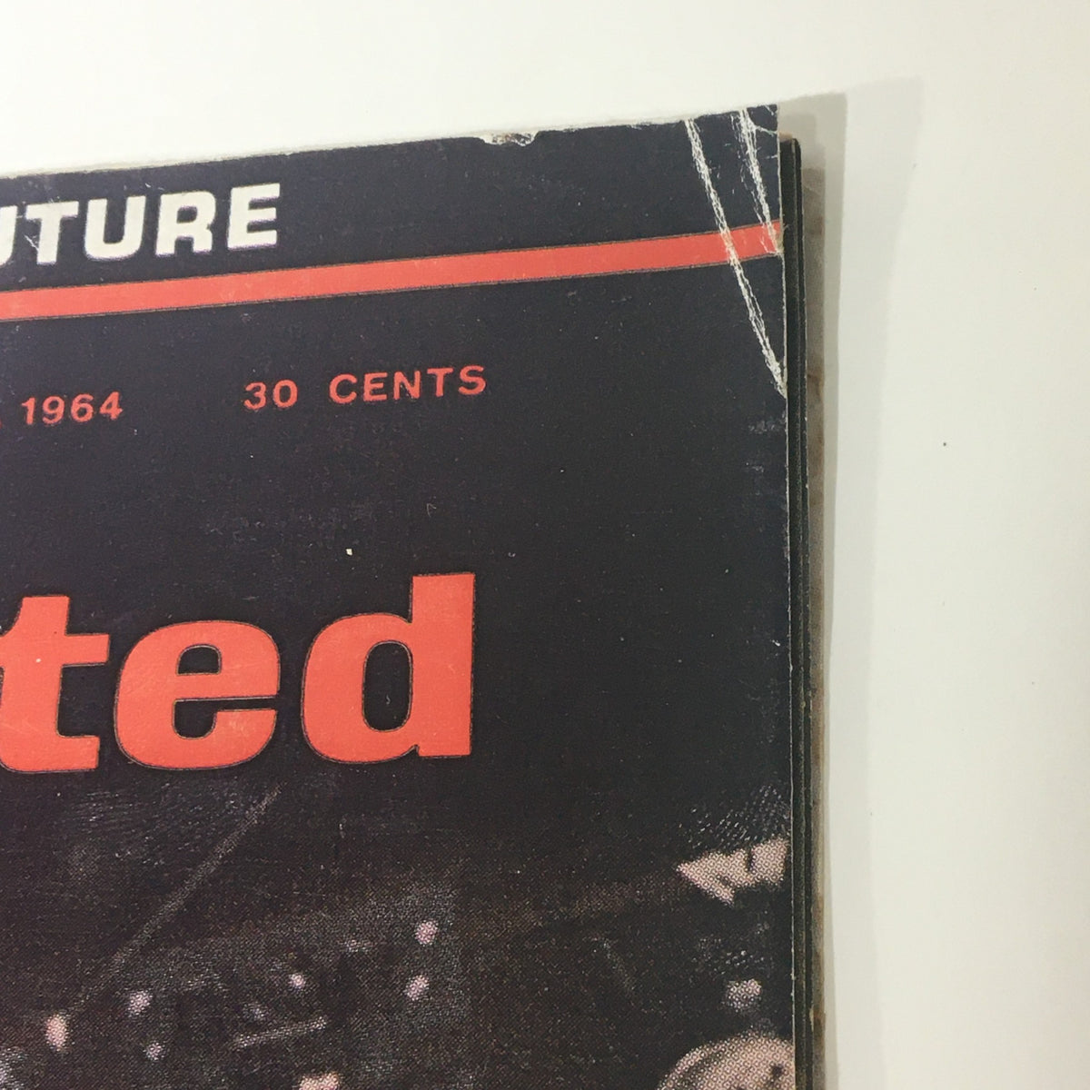 Top portion of the Sports Illustrated Magazine March 9 1954 cover, emphasizing the title and date, significant for collectors of sports memorabilia.