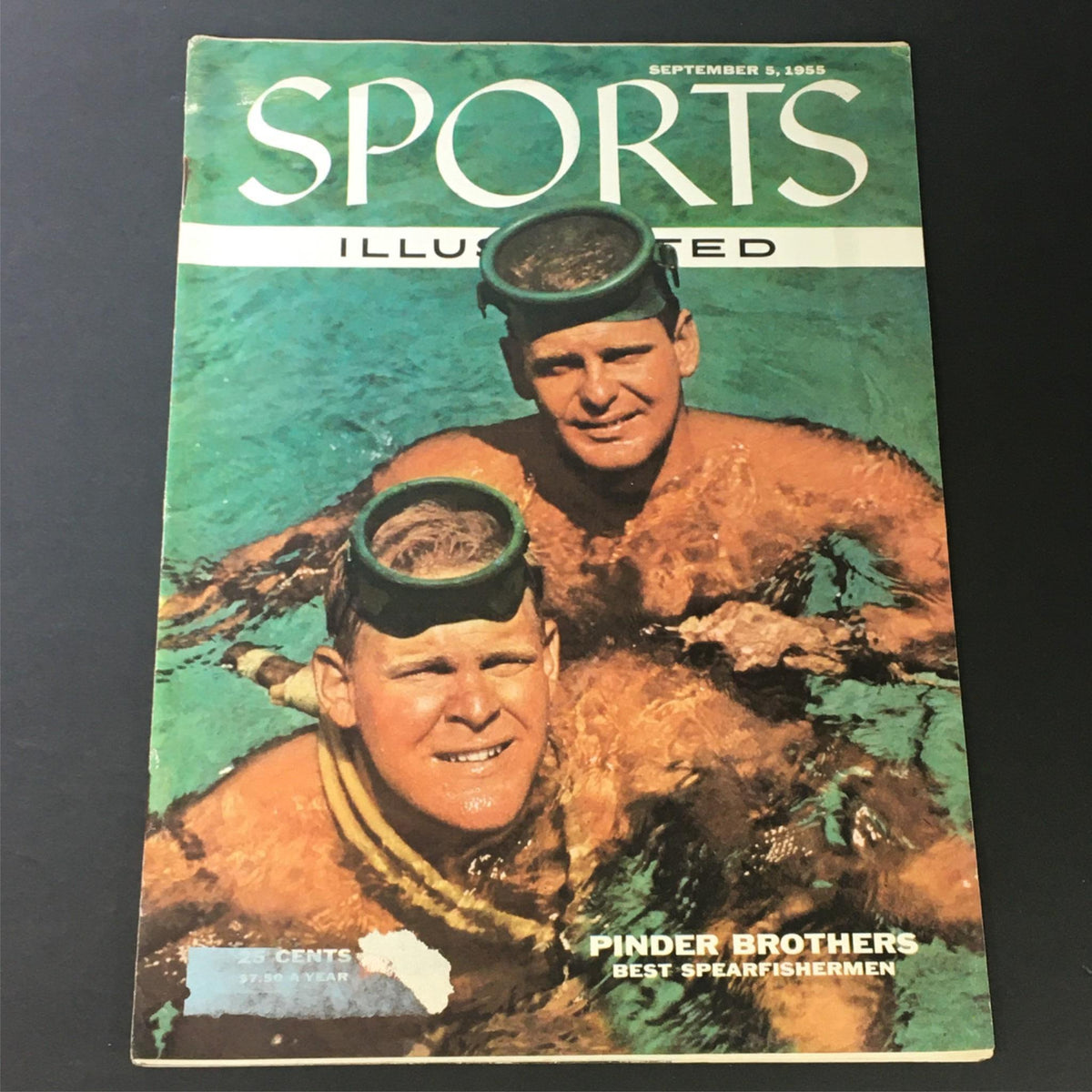 Cover of the vintage Sports Illustrated magazine from September 5, 1955 featuring the Pinder Brothers, renowned spearfishermen, showcasing a vibrant underwater image.