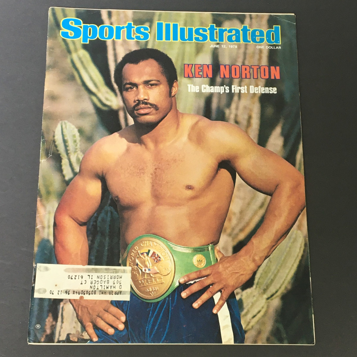 Vintage Sports Illustrated magazine cover from June 12, 1978, featuring professional boxer Ken Norton, showcasing him with a championship belt amidst a desert backdrop.