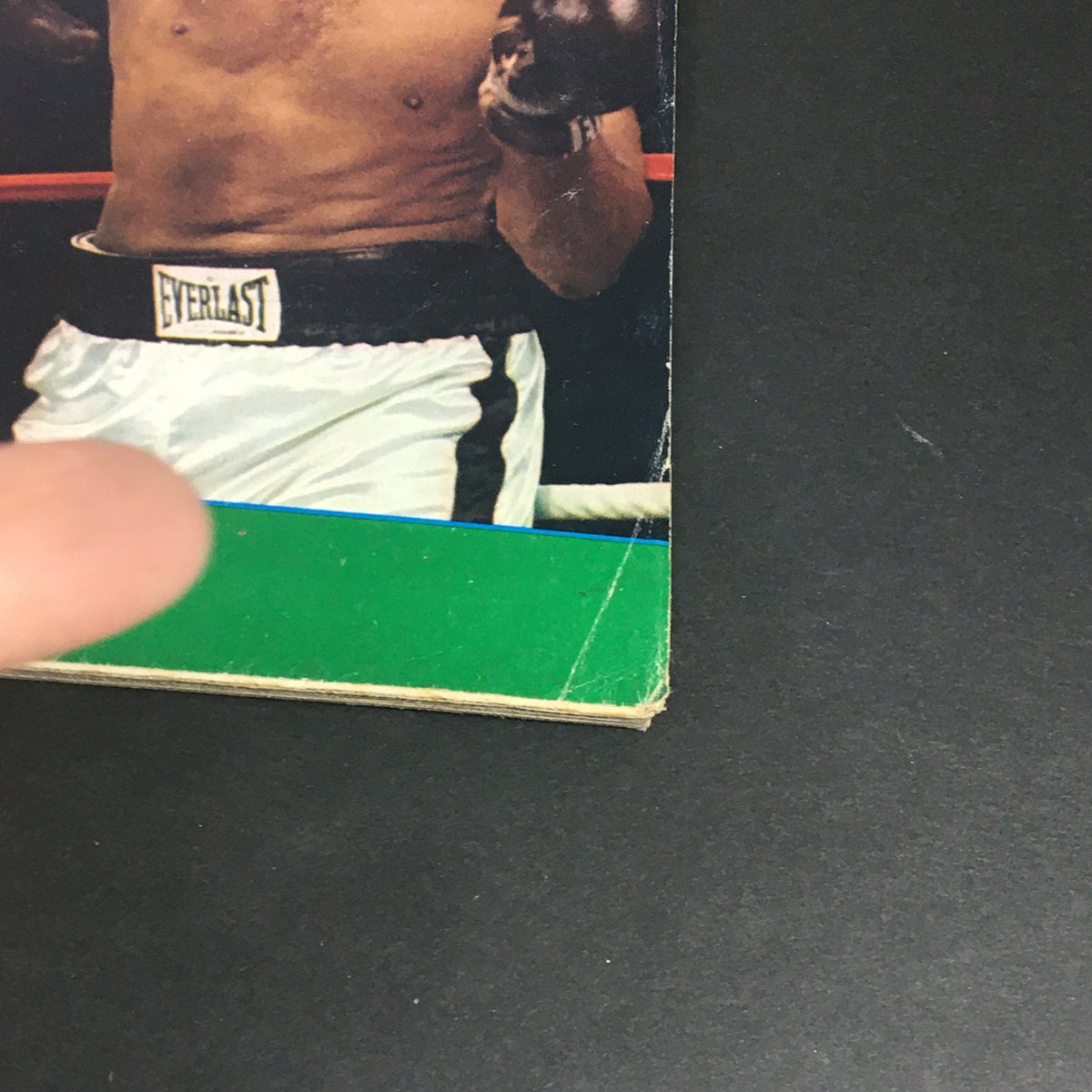 Side view of Sports Illustrated Magazine November 11 1974, displaying the iconic imagery of George Foreman vs Cassius Clay, demonstrating the magazine's vintage charm.