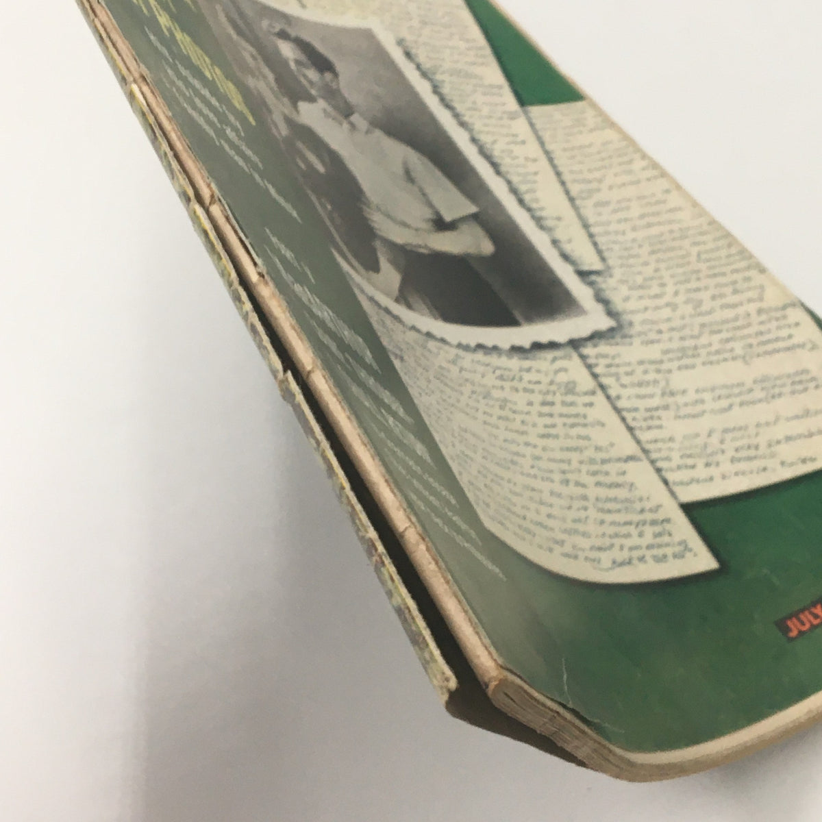 Side view of the VTG Life Magazine July 10 1964, highlighting its worn binding and aged cover.