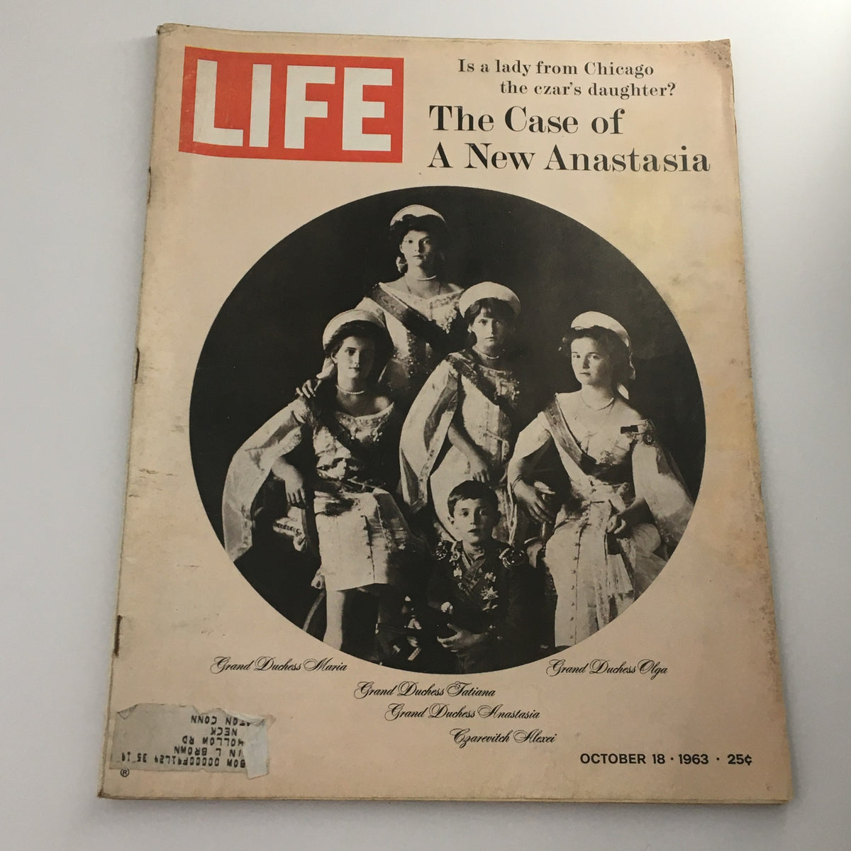 Vintage Life Magazine cover from October 18, 1963, featuring the title 'The Case of A New Anastasia' with black and white photo of five royal women including Grand Duchesses Maria, Tatiana, Anastasia, and Olga, along with a young boy. This collectible magazine explores the intriguing mystery of Anastasia.