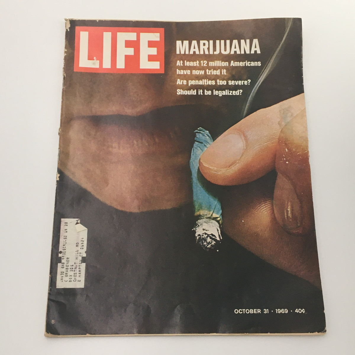 VTG Life Magazine October 31 1969 cover featuring an article on Marijuana and Americans, depicting a close-up of a cigarette held in a hand, highlighting cultural discussions about marijuana use during the 1960s.