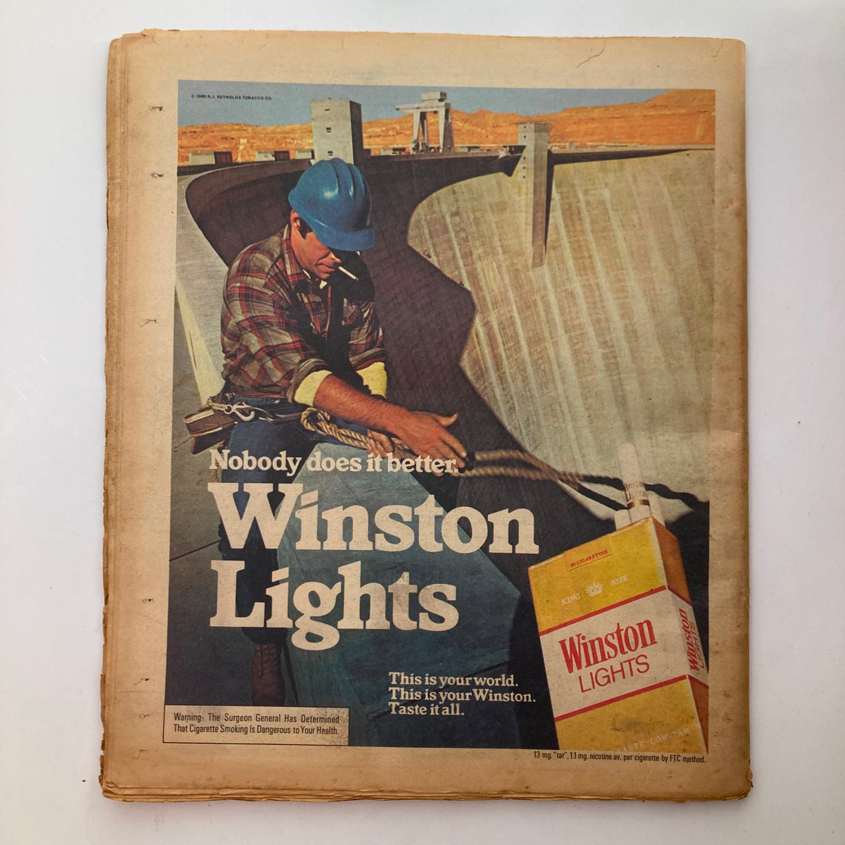 Advertisement page in VTG Rolling Stone Magazine November 27 1980 for Winston Lights cigarettes, showcasing a worker on a construction site.