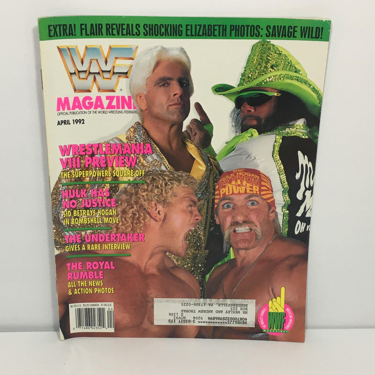 WWF Magazine April 1992 cover featuring Ric Flair, Randy Savage, and Hulk Hogan. The cover highlights major wrestling events and previews WrestleMania VIII, capturing a significant moment in professional wrestling history.
