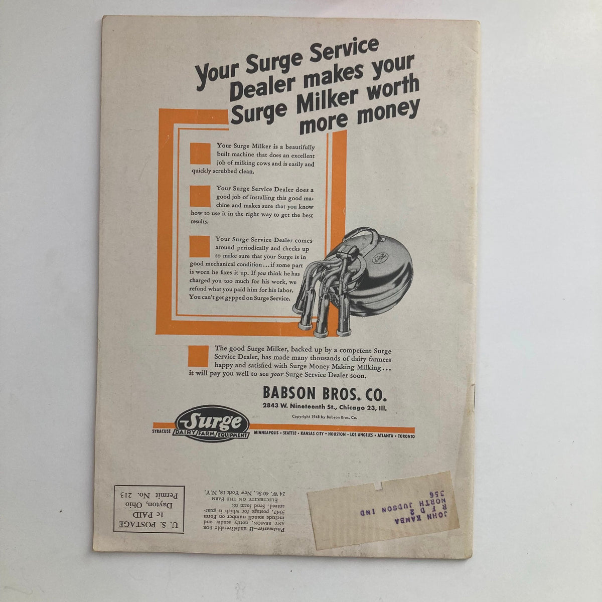 Back cover of Electricity on the Farm Magazine, November 1948, highlighting an advertisement for Surge Milkers and their benefits for dairy farming.