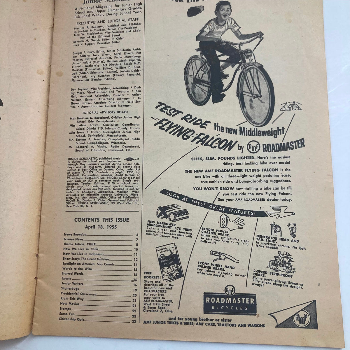 Inside page of Junior Scholastic Magazine April 13, 1955 displaying editorial staff credits and an advertisement for Roadmaster bicycles, showcasing products available at that time.