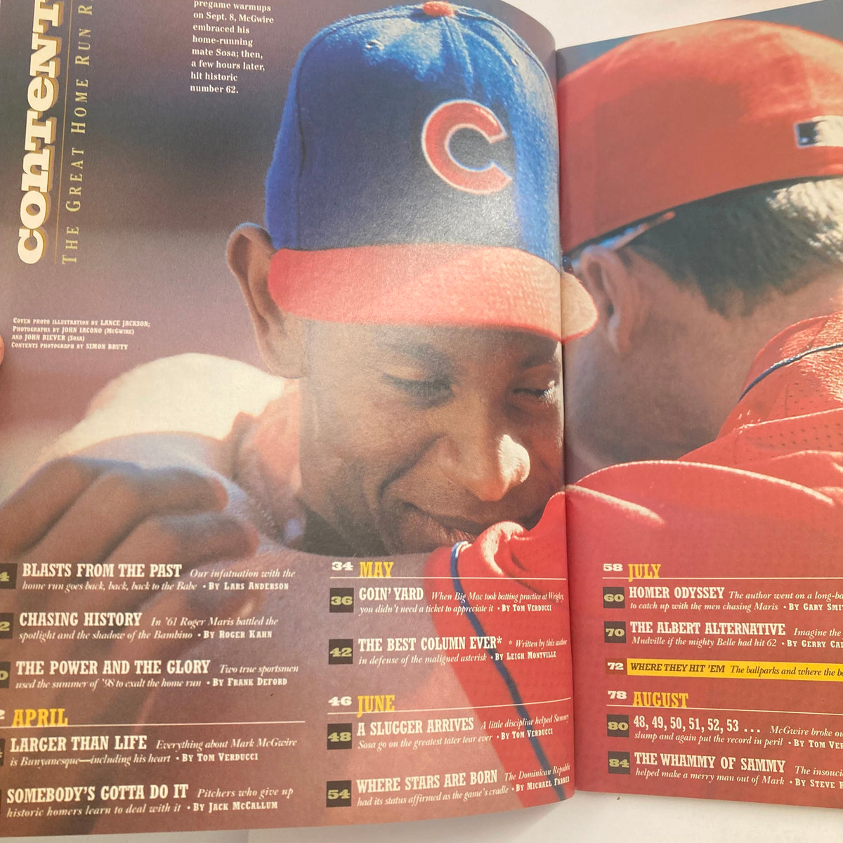 Interior page of Sports Illustrated Magazine October 7, 1998, showcasing content details and a close-up of the hats worn by baseball legends Mark McGwire and Sammy Sosa.