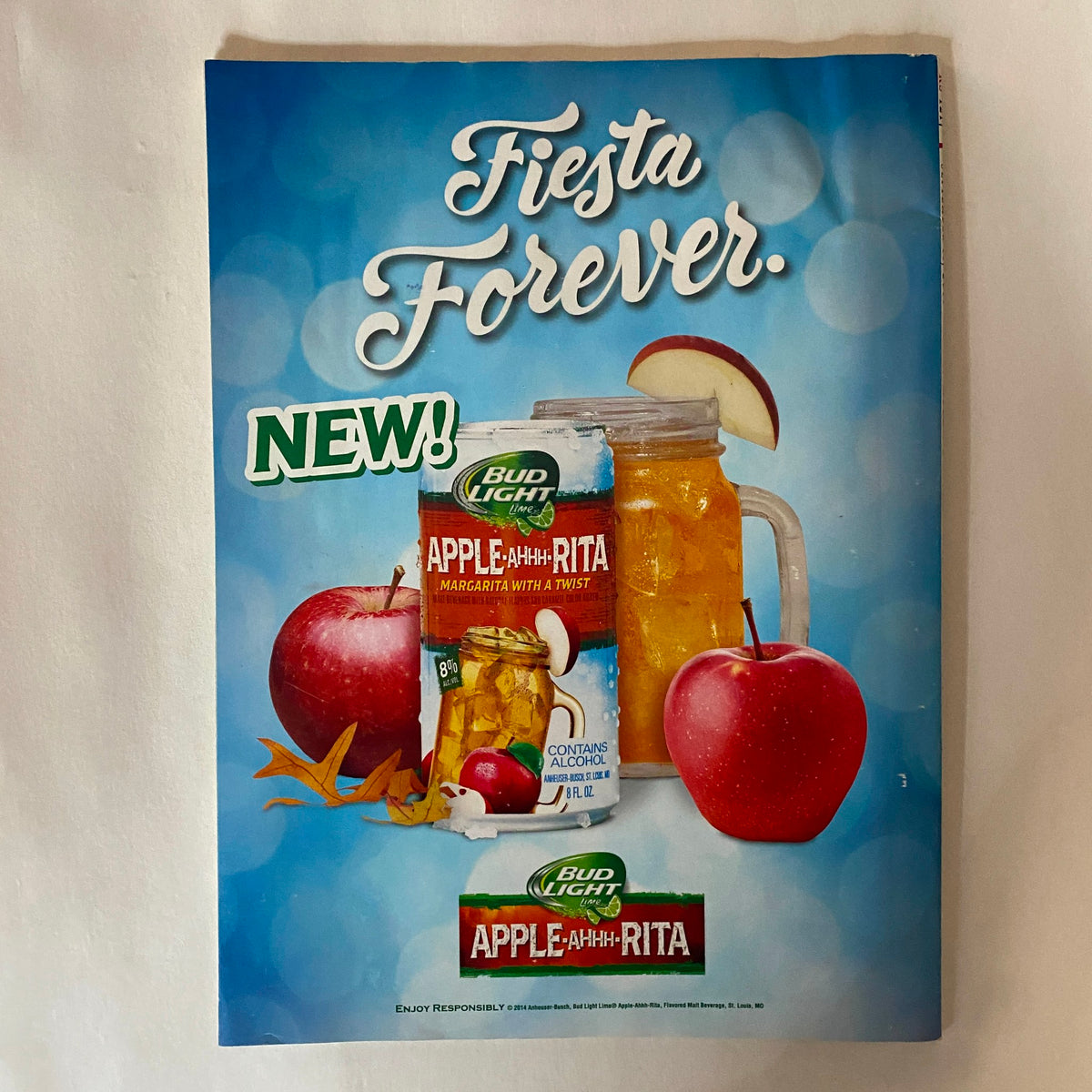 Advertisement page from Rolling Stone Magazine September 11, 2014, Issue 1217 promoting Bud Light's Apple-aahh-Rita, a new drink featuring seasonal flavors.