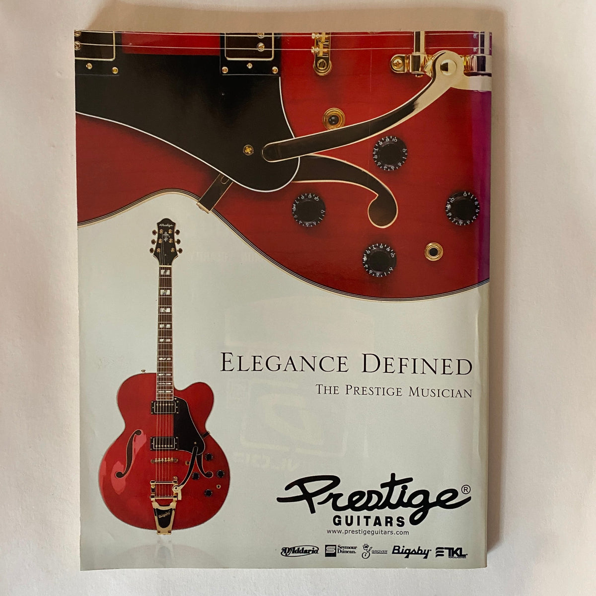Prestige Guitars promotional booklet, emphasizing elegance, included in Guitar Buyer's Guide Magazine 2011.