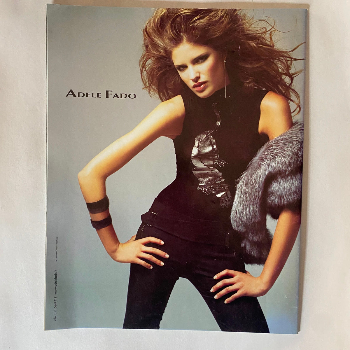 Cover of a fashion magazine featuring model Adele Fado in a chic outfit that highlights contemporary trends, from the collection of Marie Claire Italia Magazine September 2003.