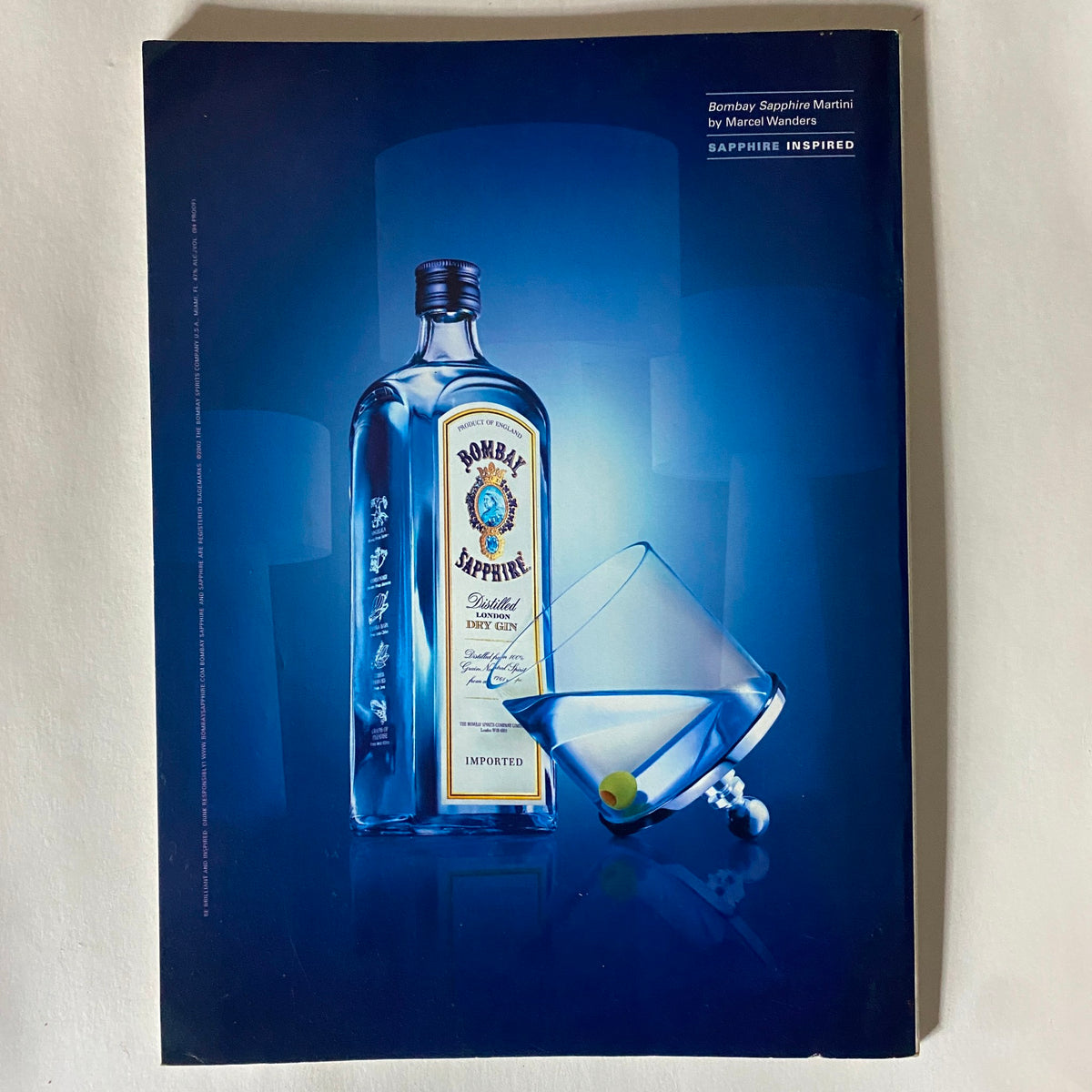 Back cover advertisement of Vanity Fair Magazine February 2003, featuring a stylized image of a Bombay Sapphire Martini, showcasing the magazine's connection to luxury and lifestyle.