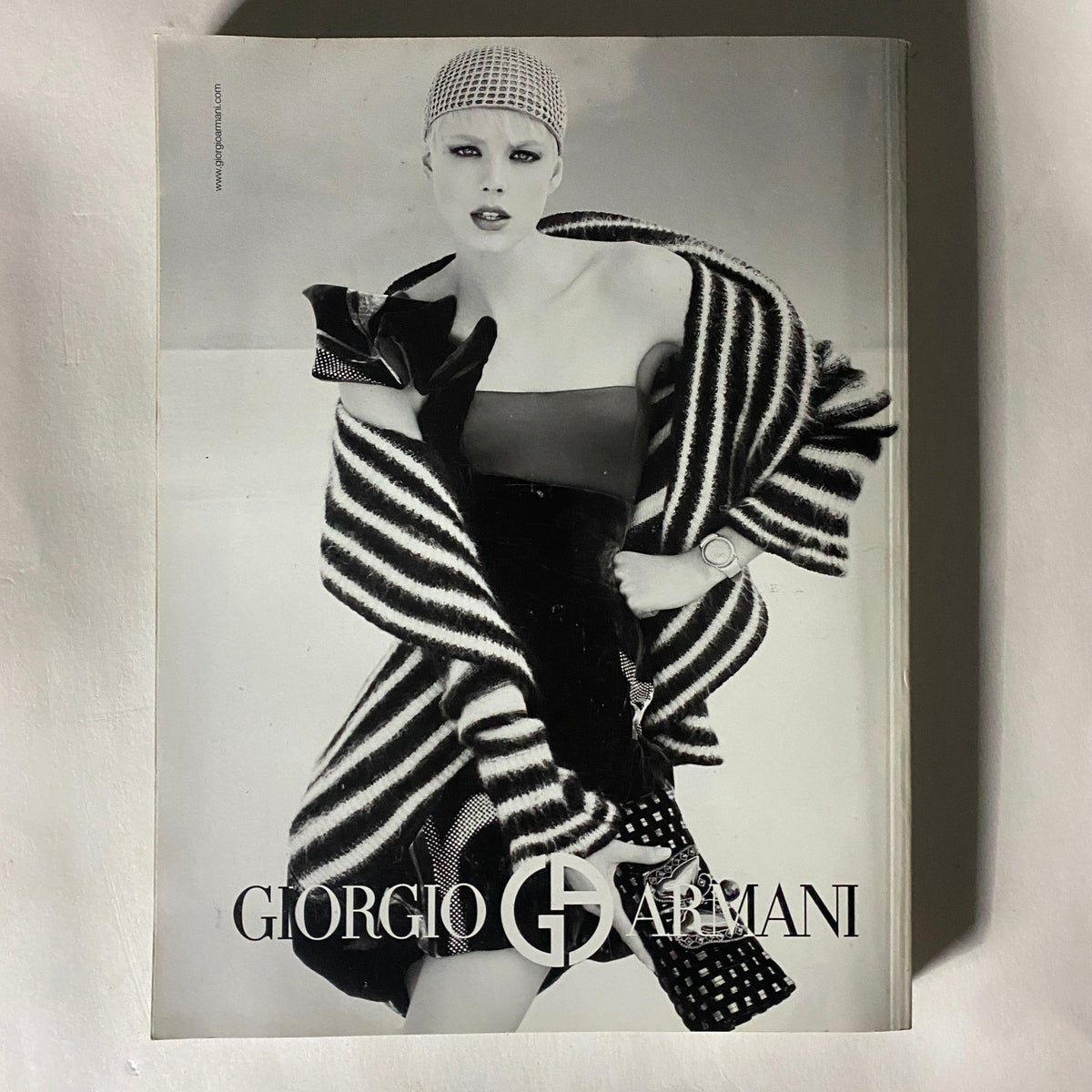 Cover of Vogue Italia Magazine October 2007 featuring a high fashion model in striking black and white attire, embodying the essence of Giorgio Armani's design aesthetic.