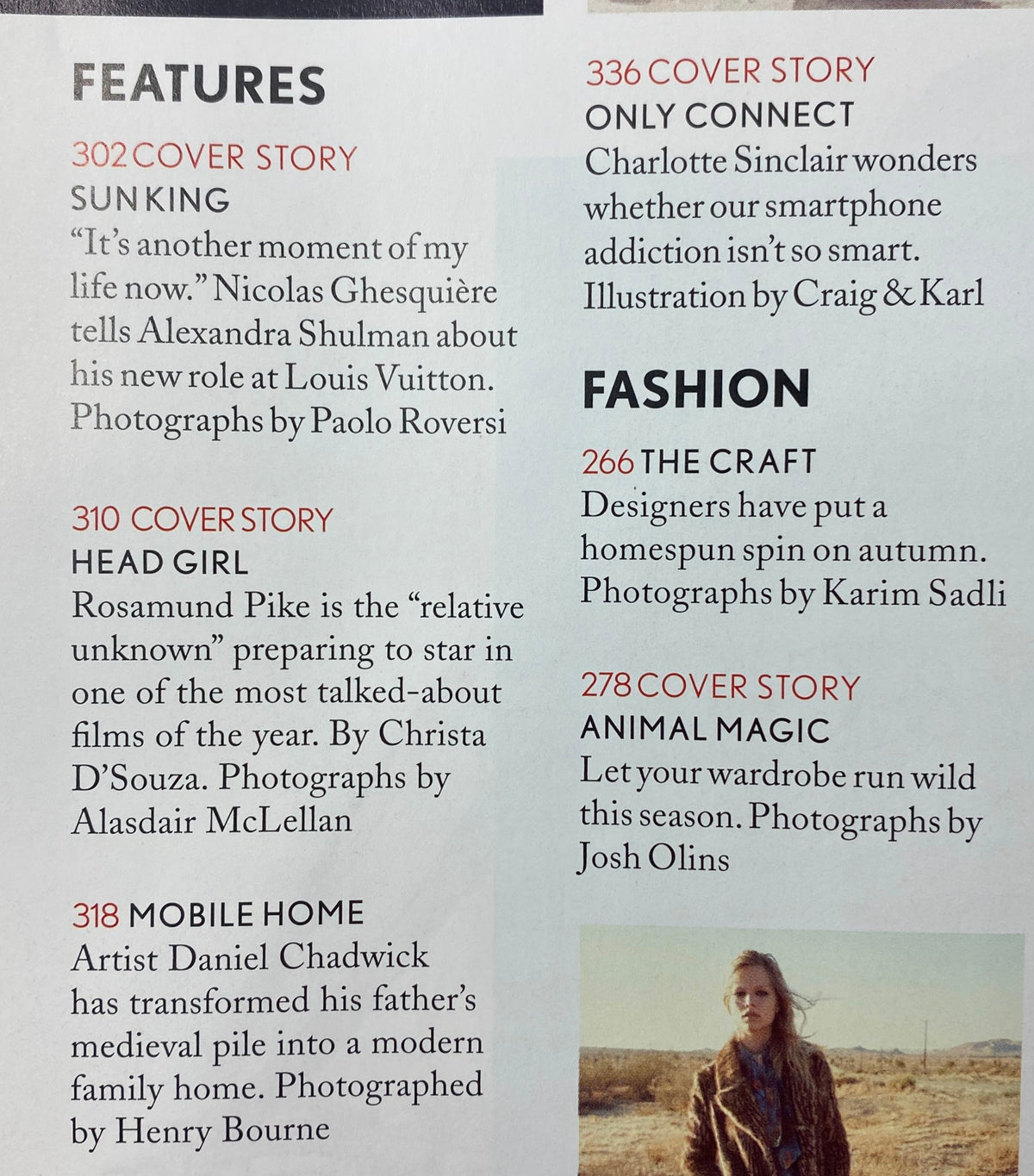 Features page of Vogue UK Magazine October 2014 with articles including 'Sun King', 'Head Girl' about Rosamund Pike, and 'Mobile Home' with photography highlights.