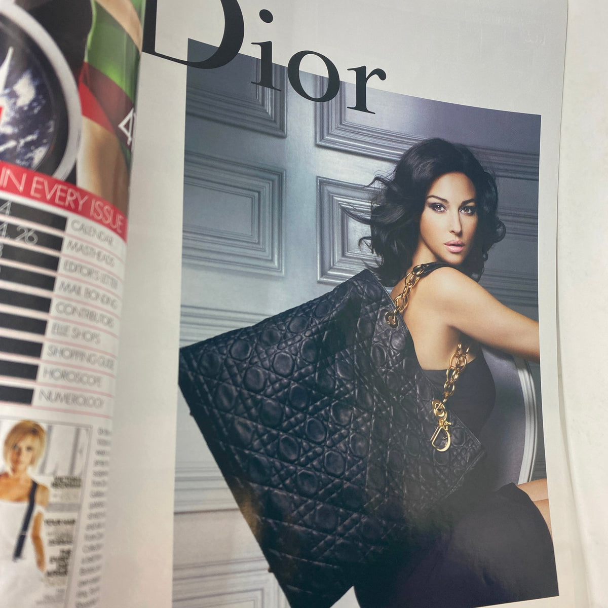 Interior page from Elle Magazine January 2008, showcasing an advertisement for Dior featuring a model with an elegant black handbag.