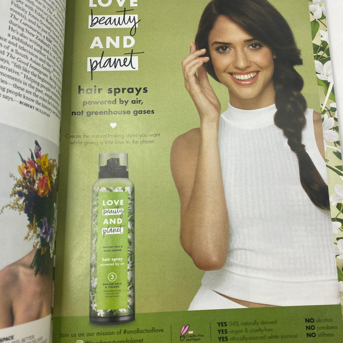 Advertisement page from Vogue Magazine June 2019 for 'Love Beauty and Planet' hair sprays, featuring a model with a bright smile promoting eco-friendly hair products.