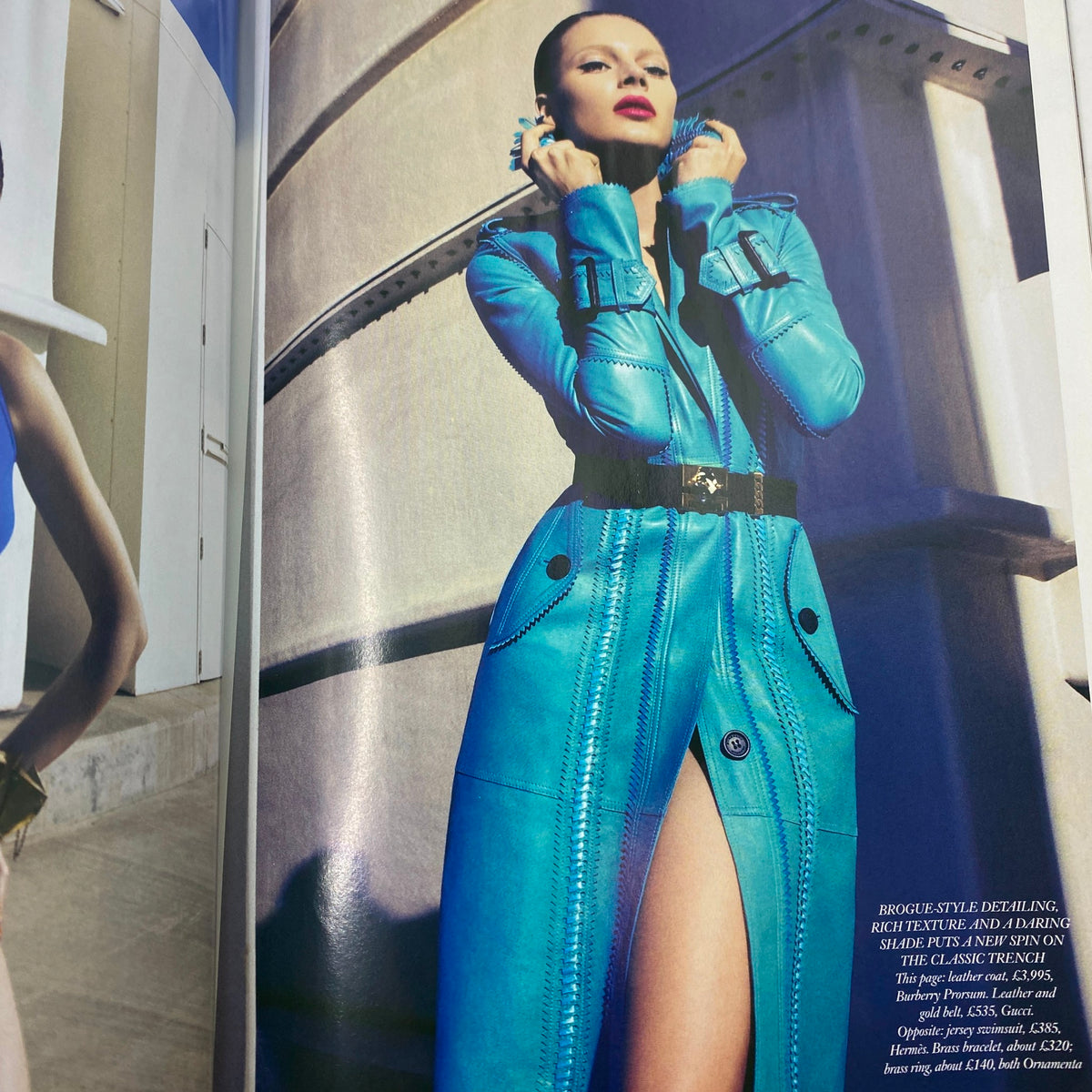Fashion spread from Harper's Bazaar UK Magazine May 2012, featuring a model in a striking blue leather coat and high-fashion styling.