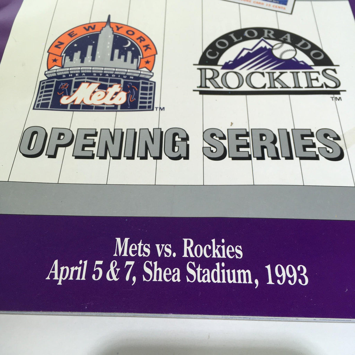Close-up view of the title section of the 1993 Mets Vs. Rockies Scorebook detailing the event date and teams.