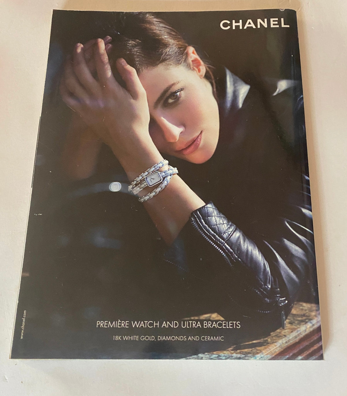 Cover of Harper's Bazaar UK Magazine November 2010 featuring an elegant model showcasing Chanel's 18K white gold, diamond, and ceramic watch and bracelet collection, emphasizing luxury jewelry.