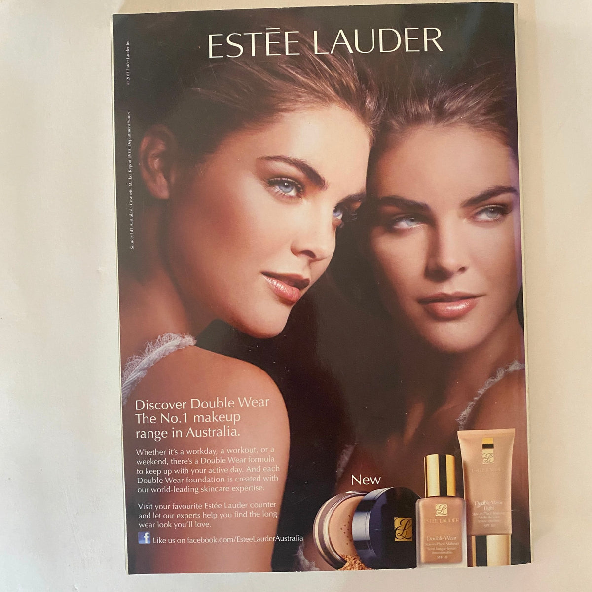 Advertisement for Estee Lauder from Harper's Bazaar Australia Magazine March 2011, highlighting the Double Wear makeup range with striking beauty imagery.