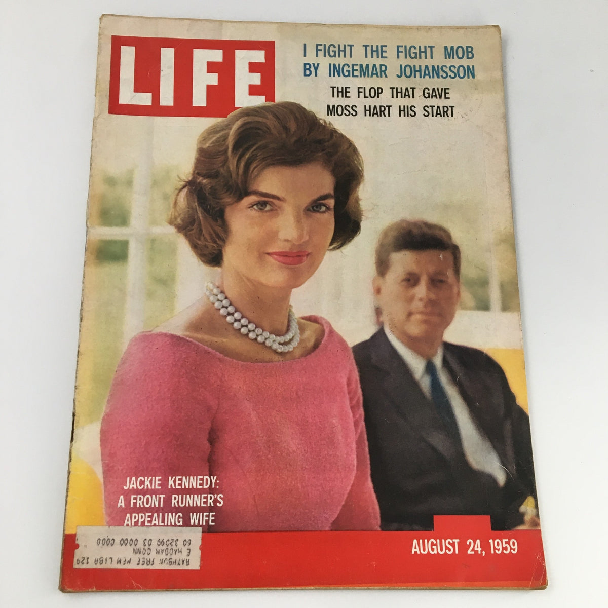 Cover of Life Magazine dated August 24, 1959 featuring Jackie Kennedy and John F. Kennedy, showcasing a vibrant photograph of Jackie in a pink outfit with pearls and John F. Kennedy in the background.