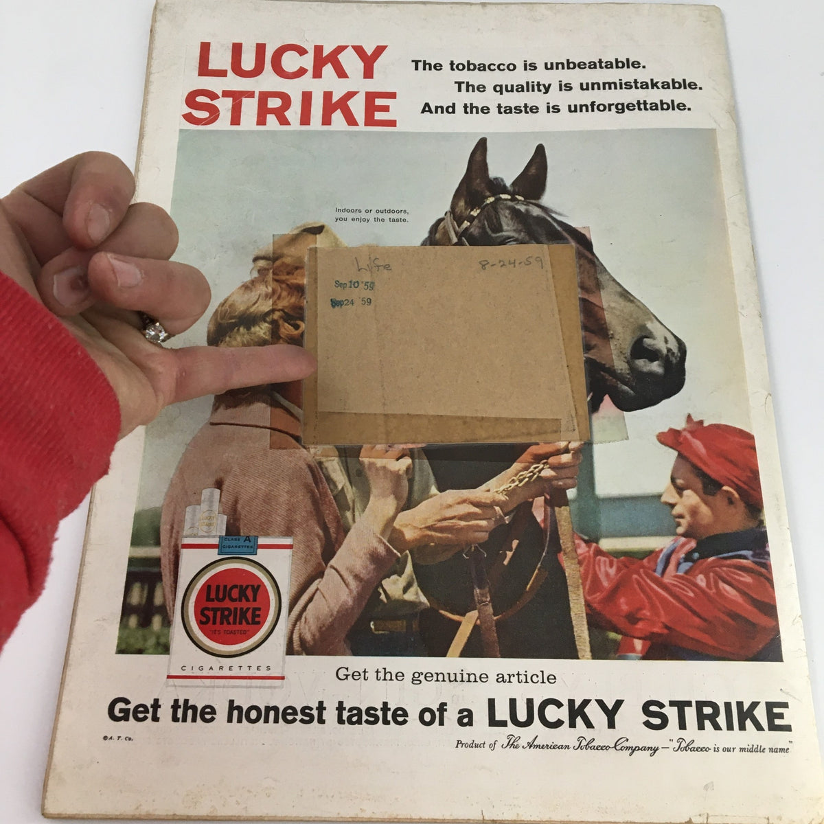Back cover of Life Magazine dated August 24, 1959, featuring an advertisement for Lucky Strike Cigarettes, showing a horse and a rider with a young boy in red.