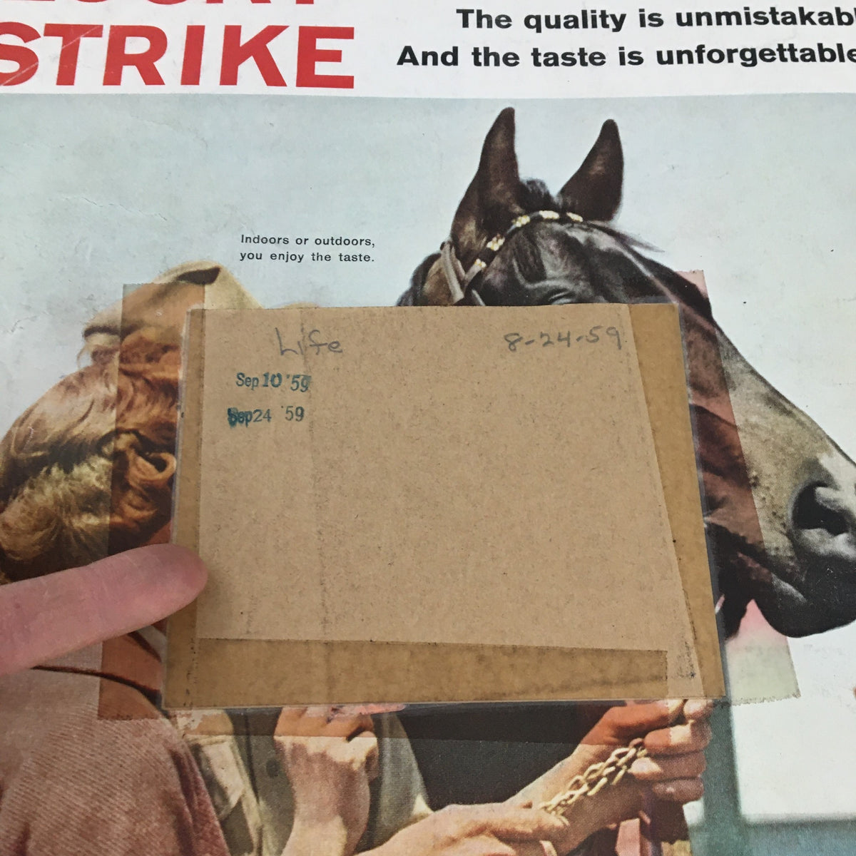 Detailed view of the back cover of Life Magazine dated August 24, 1959 with Lucky Strike advertisement including handwritten notes indicating dates and magazine details.