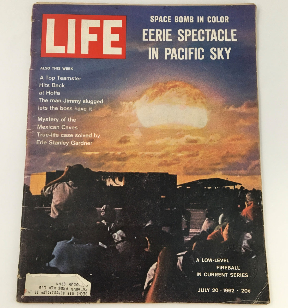 Vintage Life Magazine cover from July 20, 1962 featuring 'Space Bomb in Color' with an illustration of a fireball explosion in the Pacific sky. The cover highlights articles on the space race, and cultural reactions during that era, making it a unique collectible piece of history.