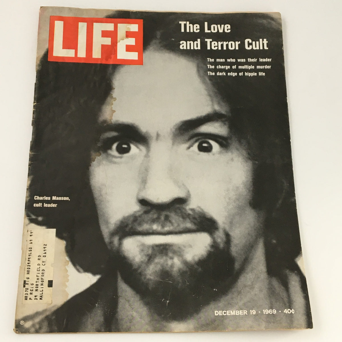 VTG Life Magazine December 19, 1969 cover photo featuring Charles Manson, the infamous cult leader, showcasing his striking gaze and dark hair.
