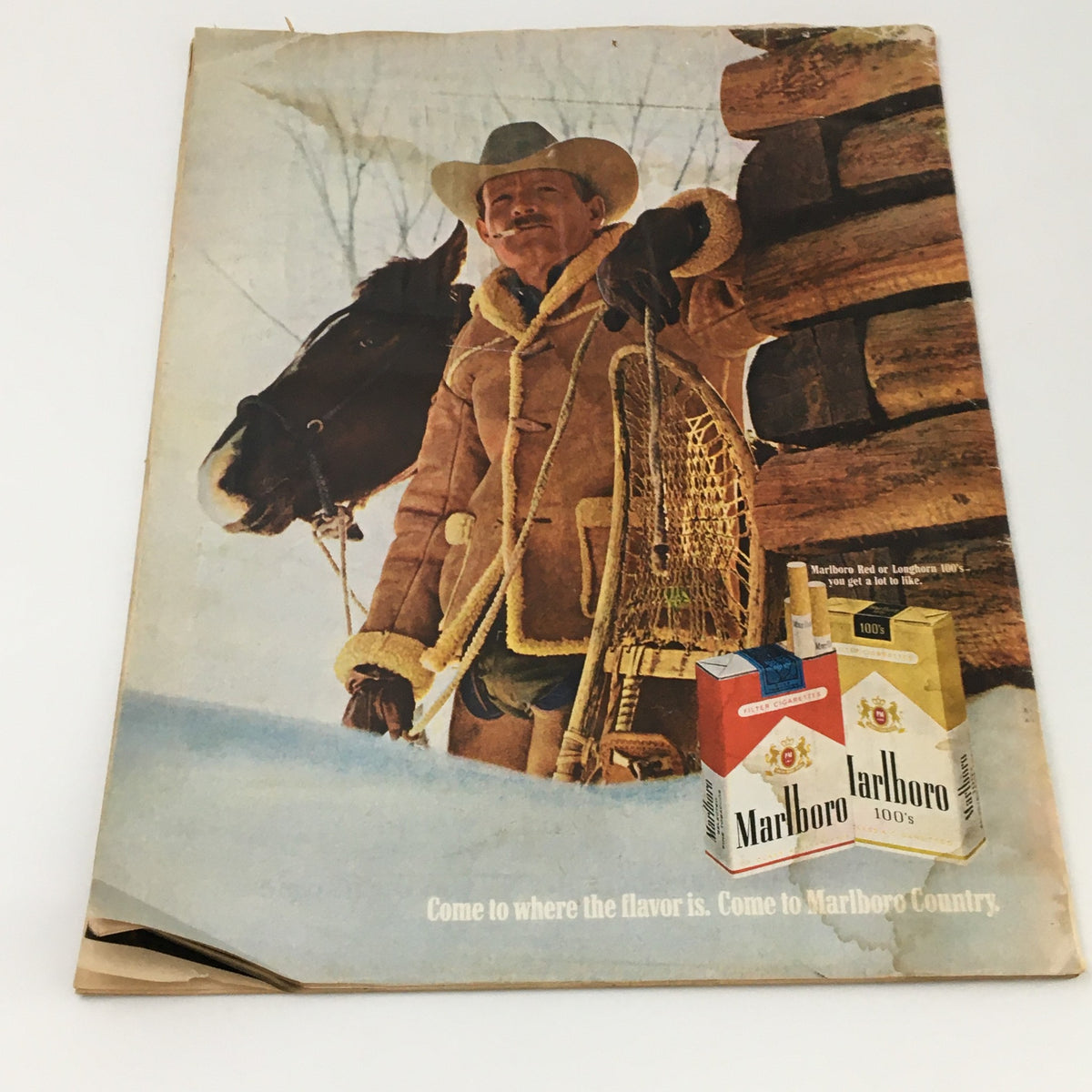 Back cover of the VTG Life Magazine December 19, 1969, displaying an advertisement for Marlboro cigarettes, set against a snowy landscape.