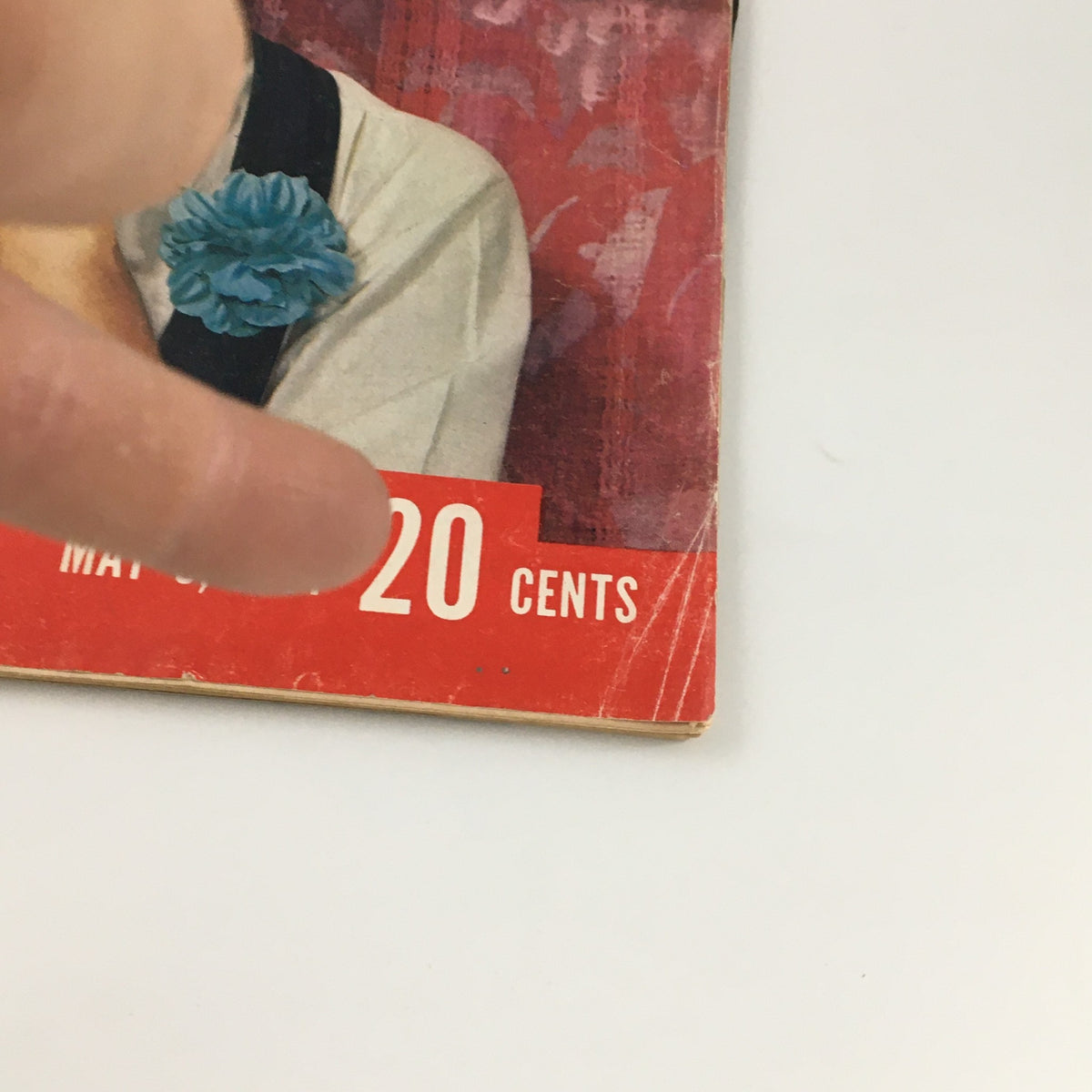 Front corner of VTG Life Magazine May 5 1961 displaying the publication date and price of 20 cents, highlighting its vintage appeal.