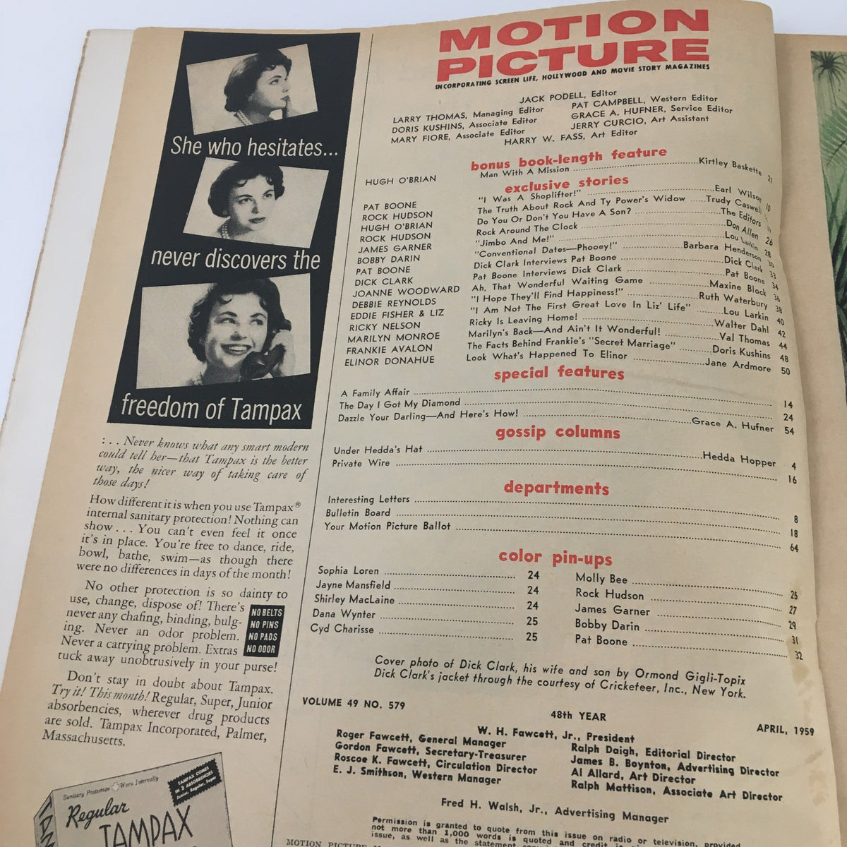 Inside page of VTG Motion Picture Magazine April 1959 featuring a list of exclusive stories and advertisements, capturing the essence of 1950s pop culture.