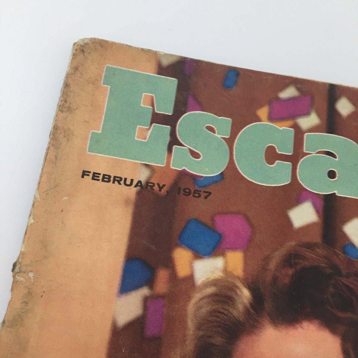 VTG Escapade Magazine February 1957 cover featuring vibrant colors and retro design, showcasing the title prominently.