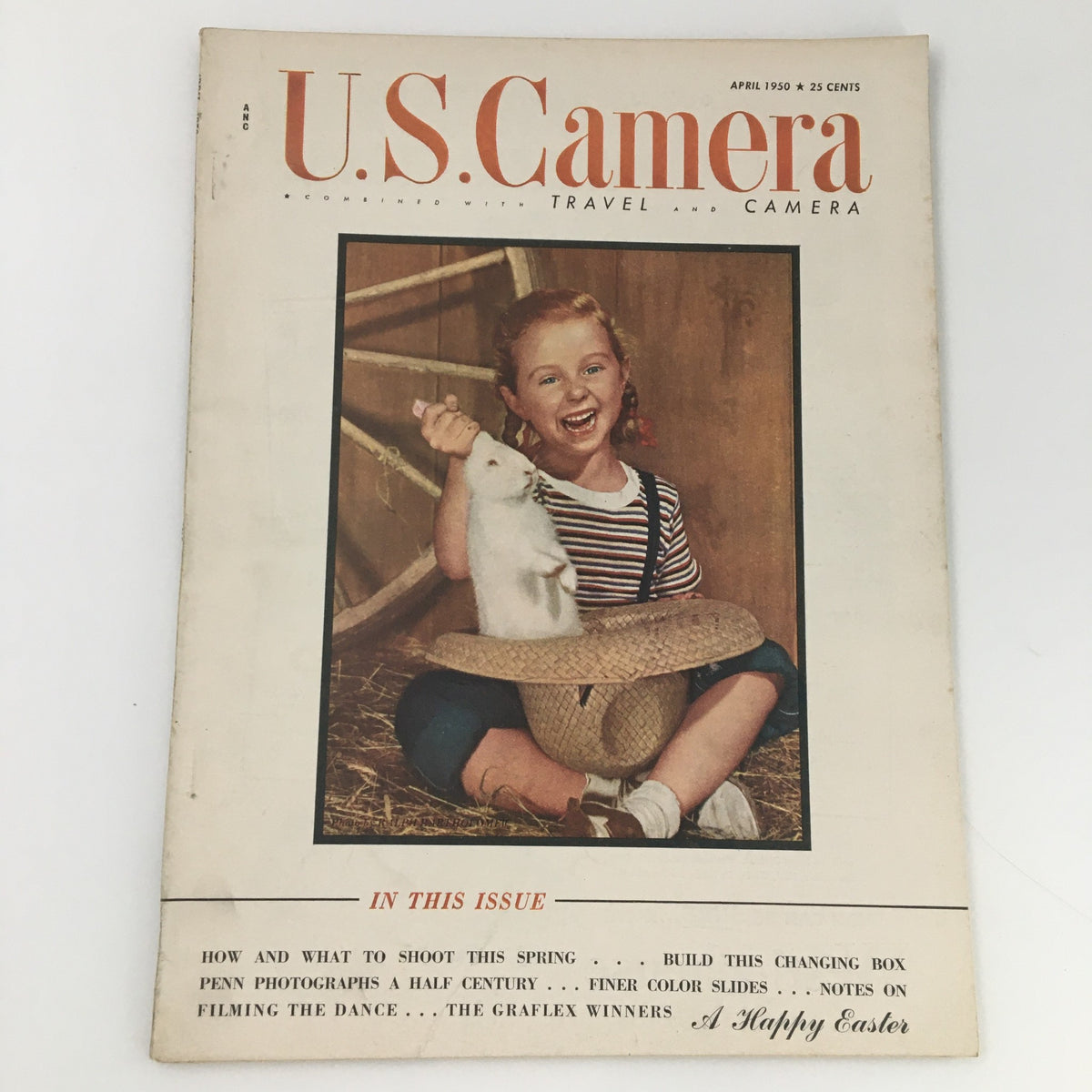 Cover of U.S. Camera Magazine April 1950 featuring a young girl holding a rabbit and smiling, highlighting The Graflex Winners feature, a collectible vintage photography magazine.