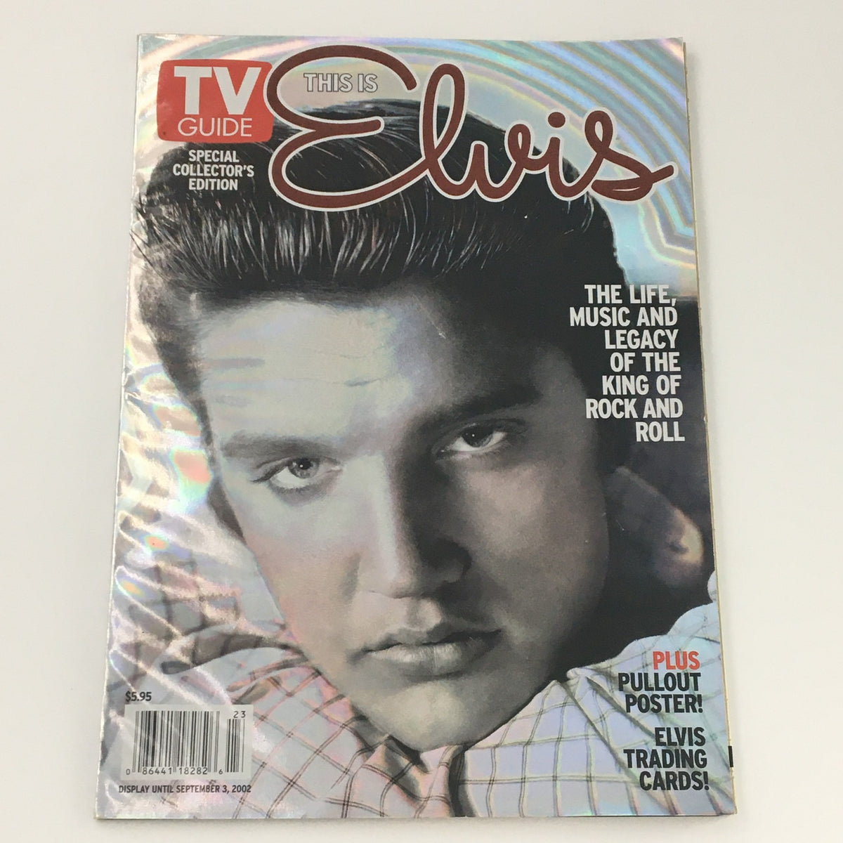 TV Guide magazine from September 2002 featuring Elvis Presley on the cover, highlighting the life, music, and legacy of the King of Rock and Roll.